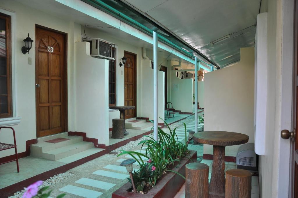 D'Lucky Garden Inn & Suites Tiniguiban Zimmer foto