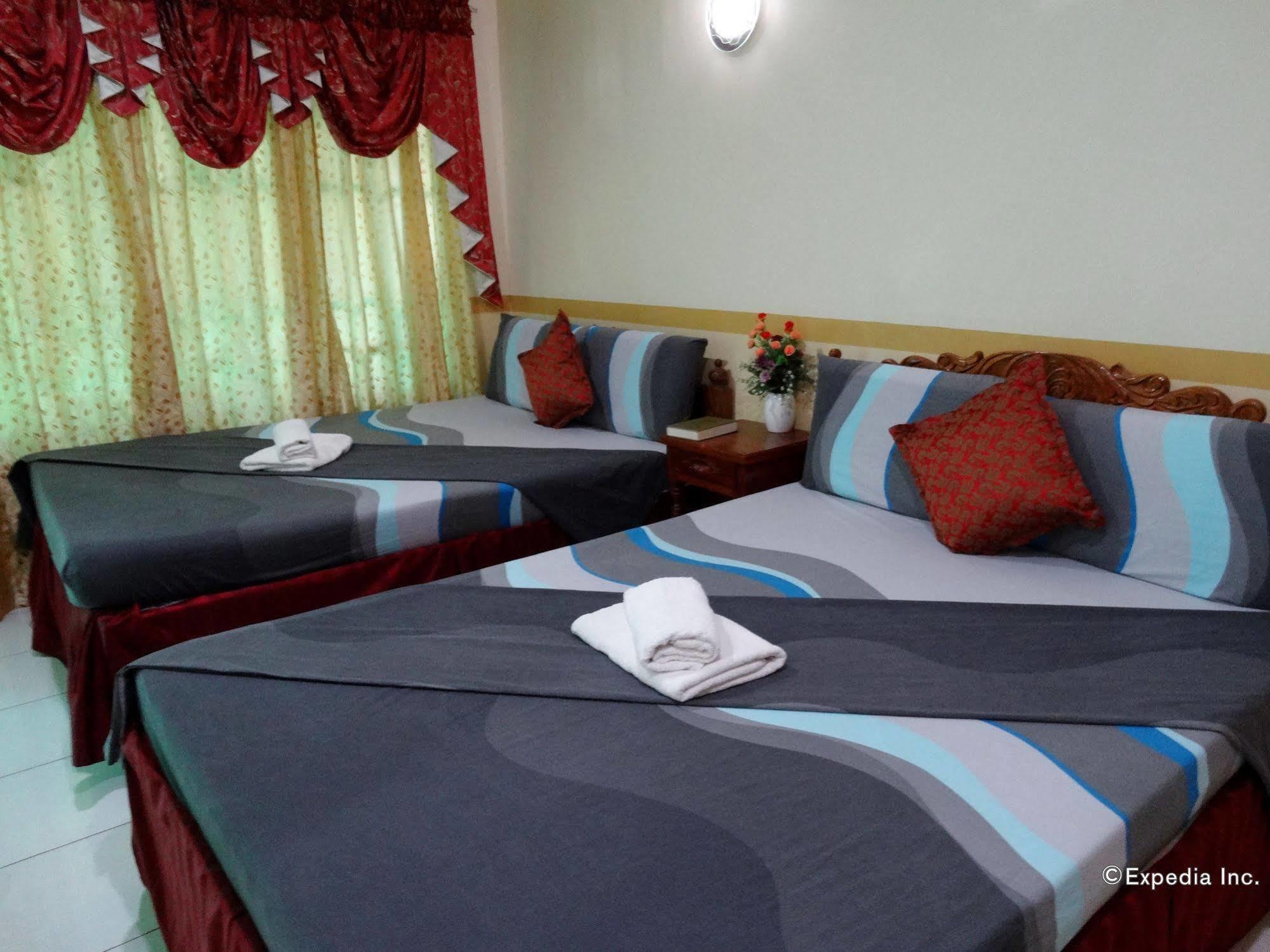 D'Lucky Garden Inn & Suites Tiniguiban Exterior foto