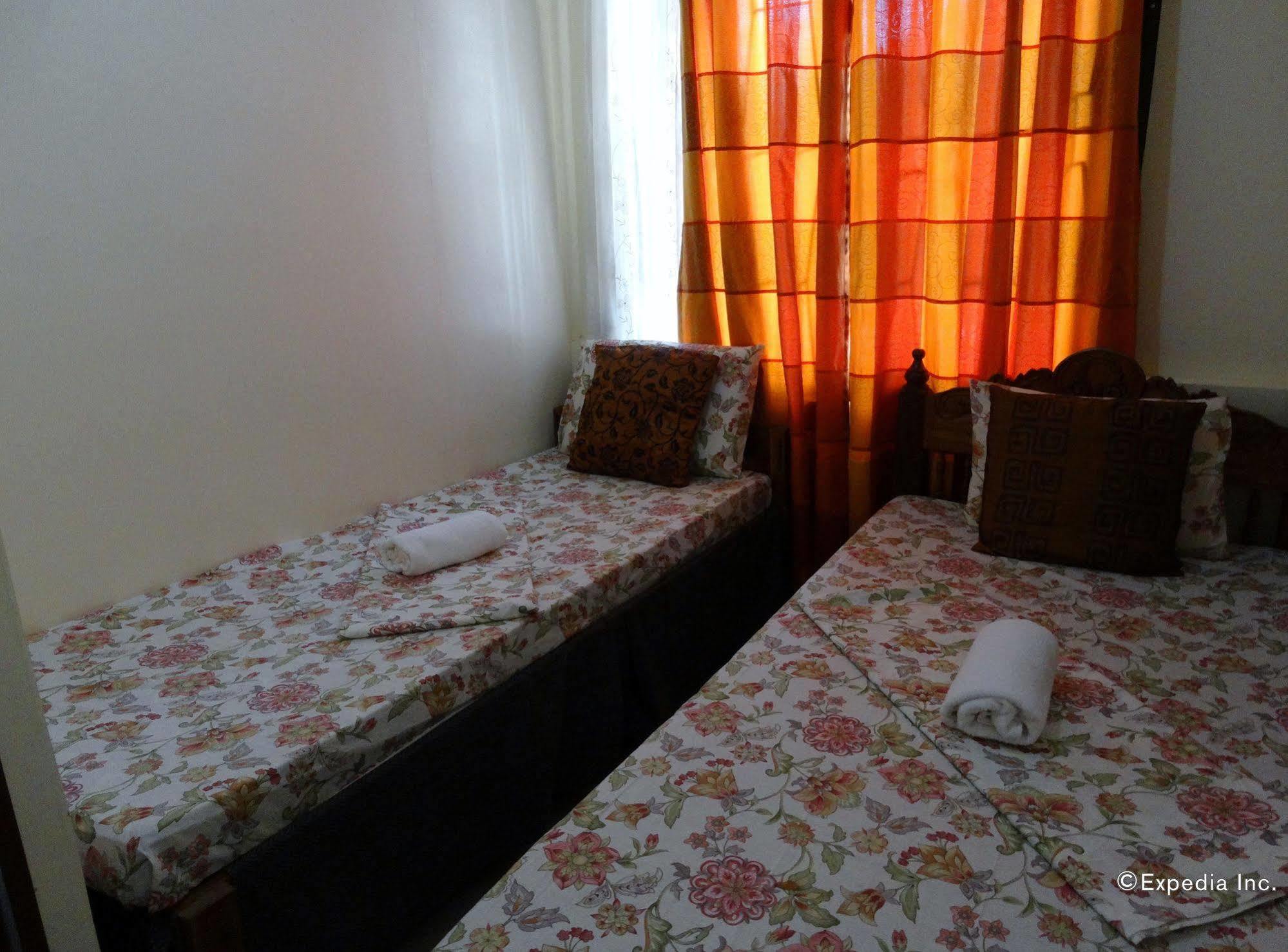 D'Lucky Garden Inn & Suites Tiniguiban Exterior foto