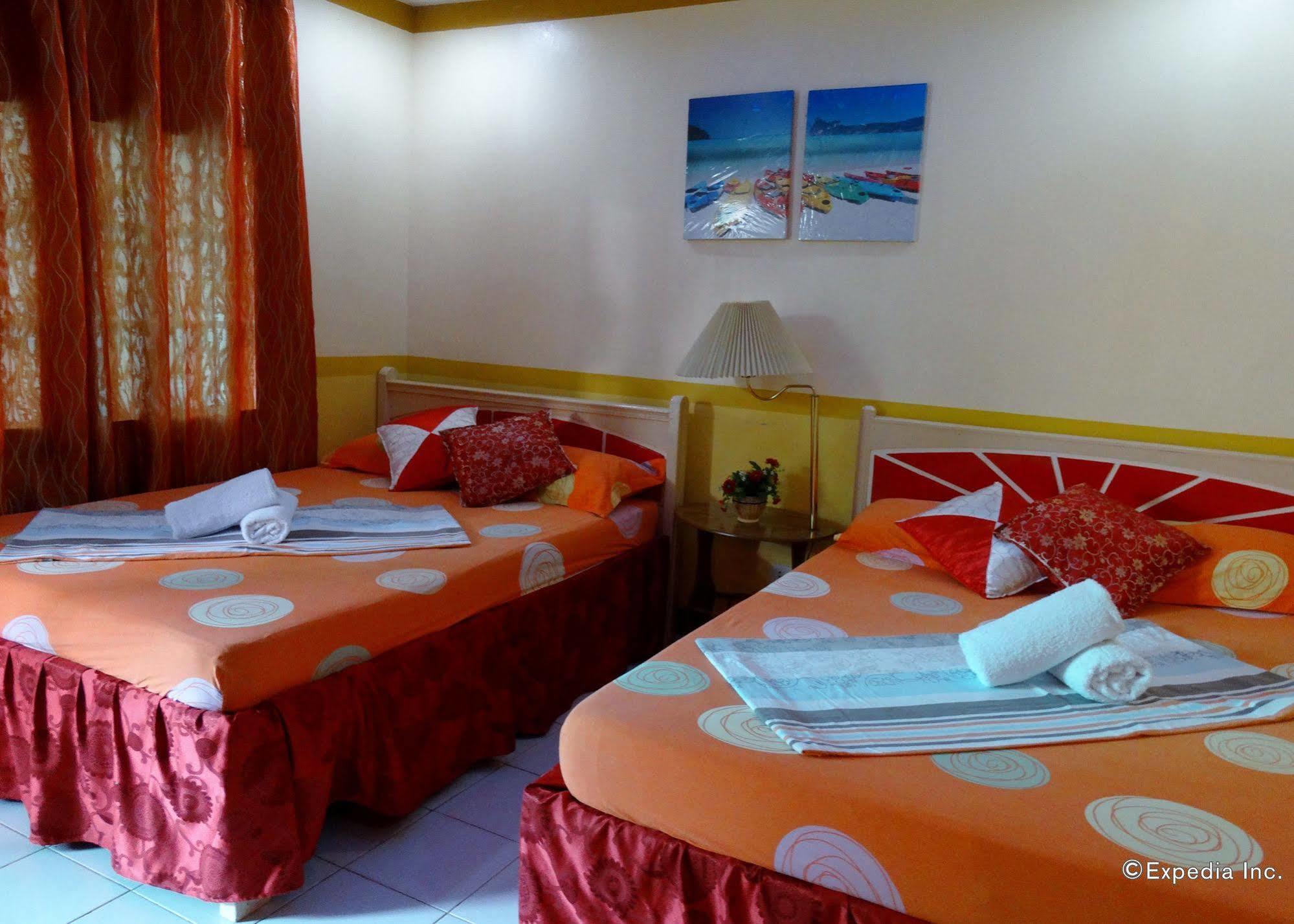 D'Lucky Garden Inn & Suites Tiniguiban Exterior foto